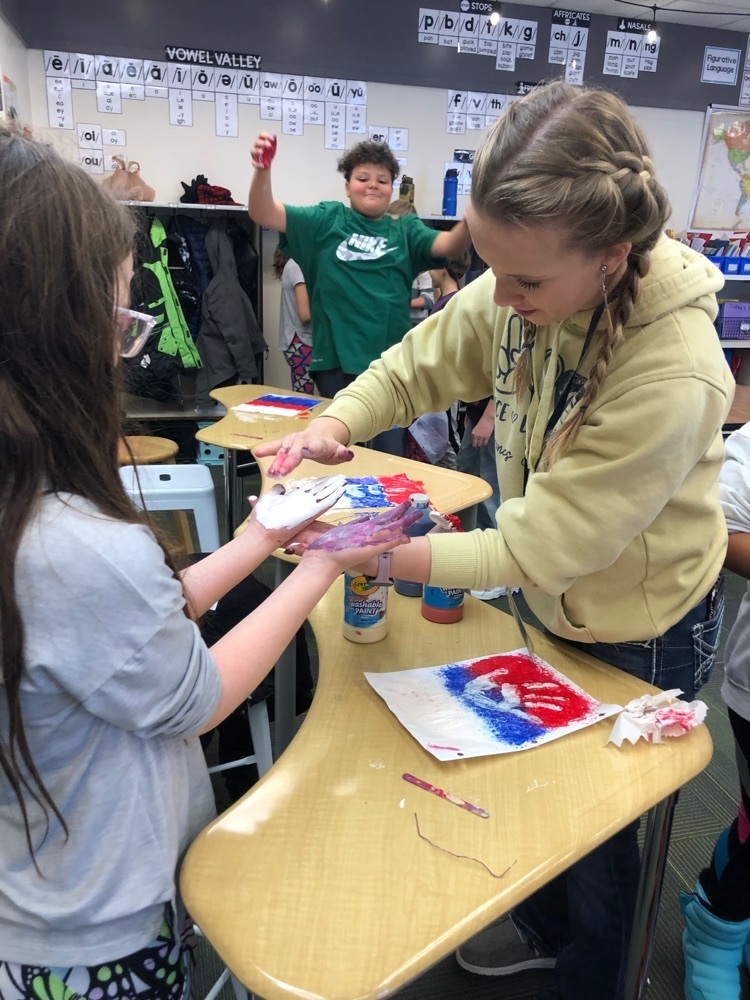 NWC student working with students